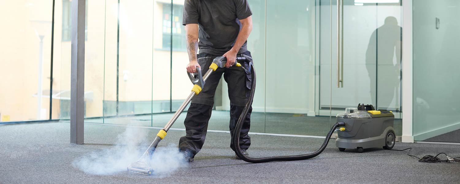 Carpet cleaning training – technician using professional equipment