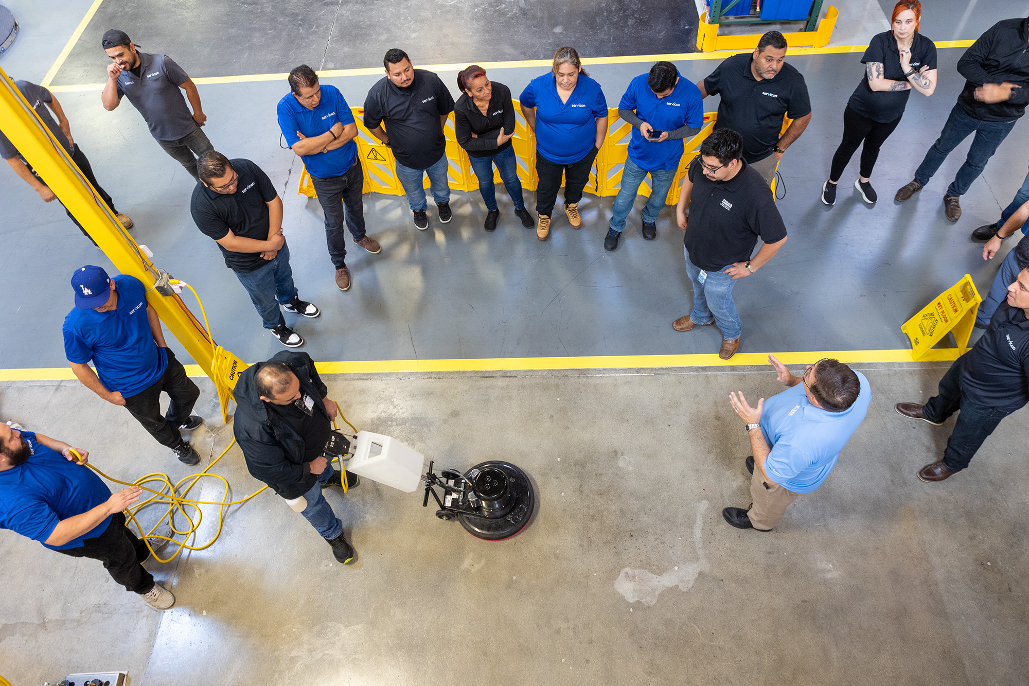 Showing how to use equipment to group of members