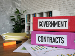 Business owner navigating the government RFP process for cleaning contracts