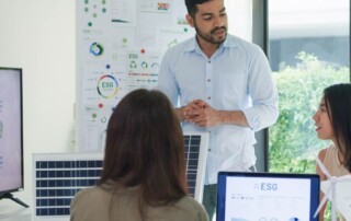 Sustainability committee meeting with professionals planning green initiatives