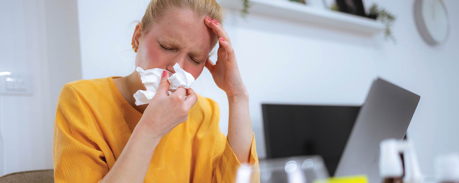 Allergic-woman-blowing-nose-in-napkin-sit-at-home-1777158421