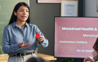 Free menstrual product dispenser in a clean public restroom to help end period poverty