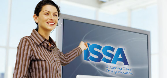 Woman pointing at screen with ISSA Logo on it